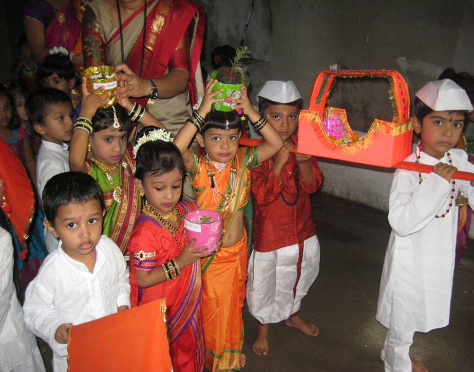 Preschool children dressed as Warkaris during Palkhi celebration at school